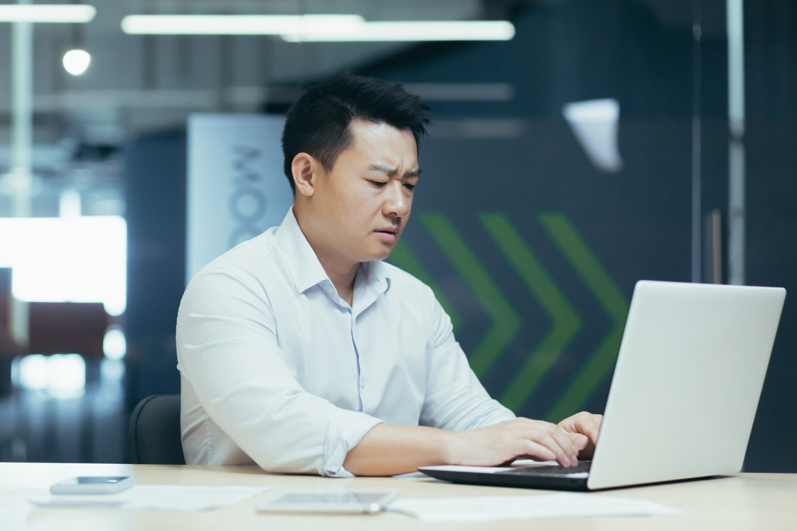 Office employee with laptop